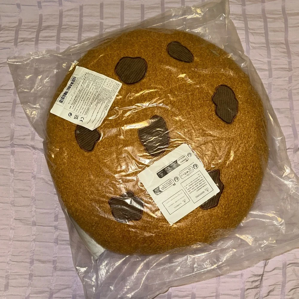 Sweeten up your space with this adorable Chocolate Chip Cookie Plush Pillow!
